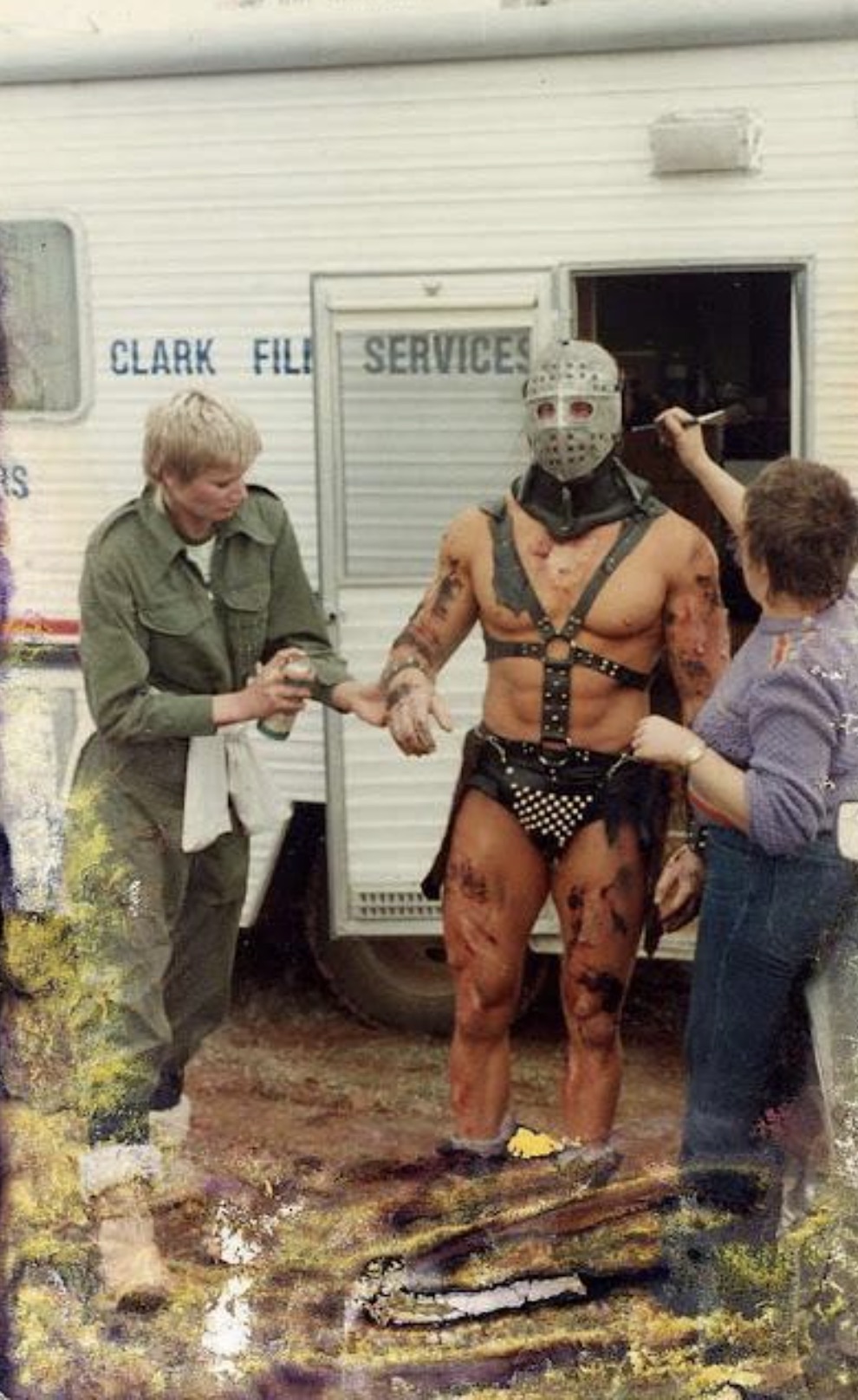 The make-up artists do the final touch ups before filming. Mad Max 2 : The Road Warrior, 1981 